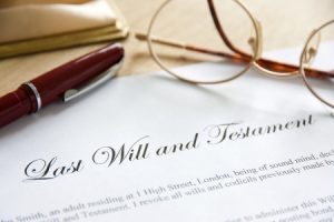 18954926 - last will and testament concept image complete with spectacles and pen.